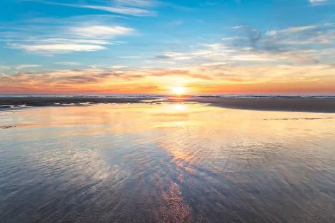Beautiful sunset at the beach Stock Photos
