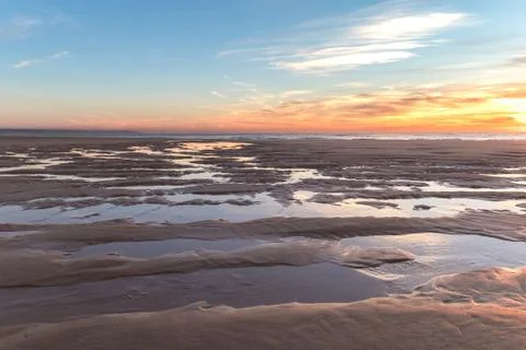Beautiful sunset at the beach Stock Photos