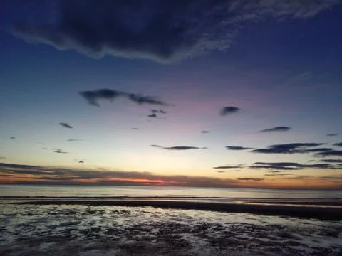 Beautiful sunset on the beach Stock Photos