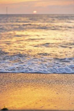 Beautiful sunset at the beach. Stock Photos