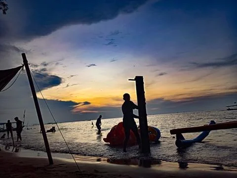 Beautiful sunset on the beach Stock Photos