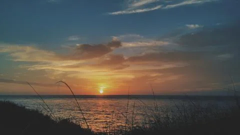 Beautiful sunset on the beach Stock Photos