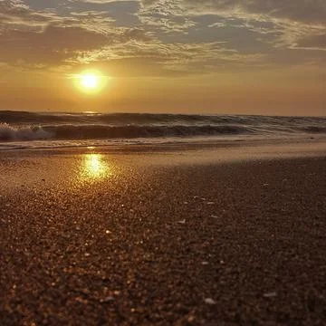 Beautiful sunset at the beach Stock Photos