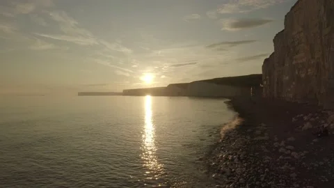 Beautiful sunset beach, pull back reveal Stock Footage 132817865