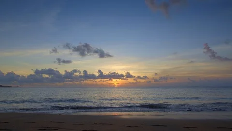 Beautiful sunset beach with waves and blue sky and clouds Video stock 113268825