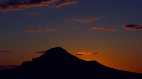 Beautiful sunset behind a mountain Stock Footage 75479509