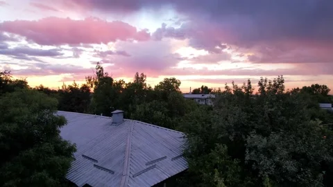 Beautiful sunset with big clouds over the city Stock Footage 204989102