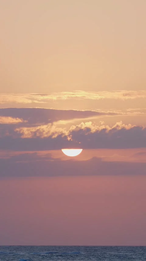 Beautiful Sunset, Big Sun in Clouds above Atlantic Ocean. Stock Footage 275547156