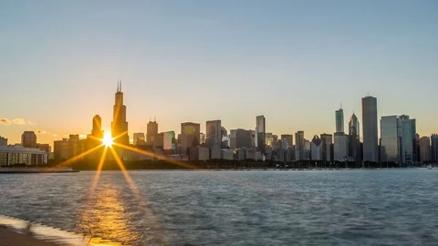 Beautiful Sunset in Chicago through buildings 4K 1080P Stock Footage