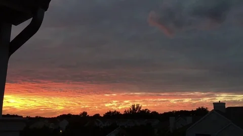 A beautiful sunset with clouds and dramatic colors. Stock Footage 80616501