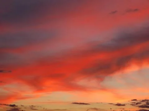 Beautiful sunset clouds fire red dawn reflection Stock Photos