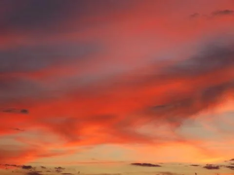 Beautiful sunset clouds fire red dawn reflection Stock Photos