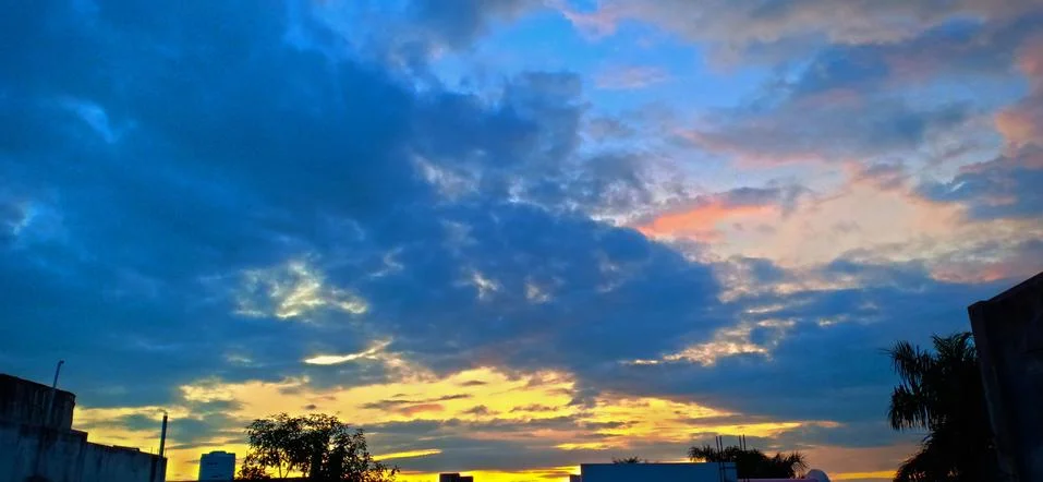Beautiful sunset in clouds Stock Photos