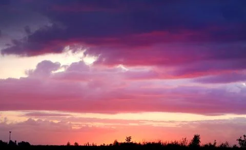 Beautiful sunset clouds in the sky Stock Photos