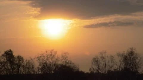 Beautiful sunset in the clouds. Timelapse before dark Stock Footage 240939983