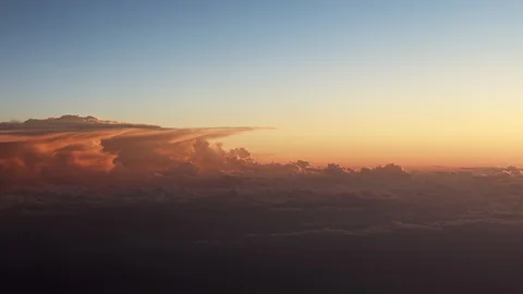Beautiful sunset cloudscape view from airplane window.  Stock Footage 92074222