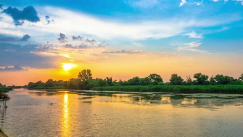 Beautiful Sunset Cloudy Sky over the River with Rain Stock Footage 158807461