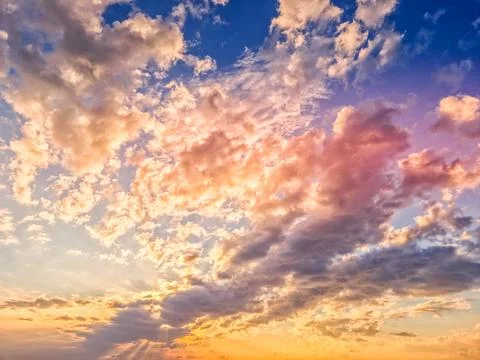Beautiful sunset in a cloudy sky Photos