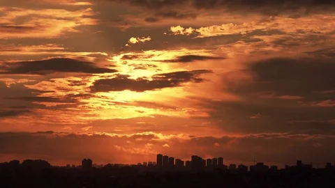 Beautiful sunset on a cloudy sky, timelapse Stock-Footage 77818790