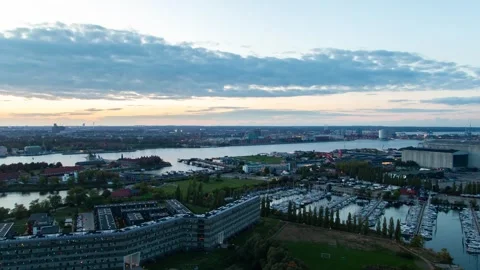 Beautiful Sunset in Copenhagen Featuring River Boats and Urban Life Stock Footage 312985123