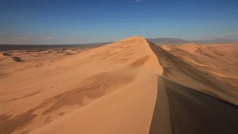 Beautiful sunset in the desert. Sandstorm on the dune Stock Footage 80454858