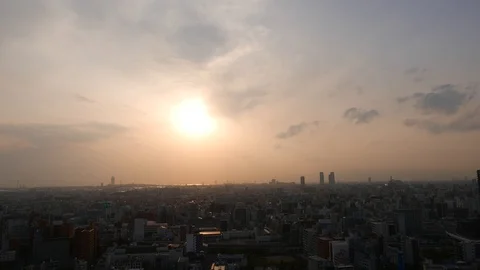 Beautiful sunset downtown panorama, setting sun over Osaka city, Japan Stock Footage 90377744