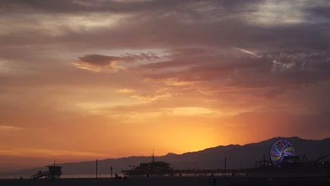 Beautiful sunset with dramatic colors on Venice, Los Angeles of the Santa Monica Stock Footage 89561458
