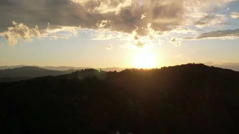 Beautiful sunset with drone. In the foreground a mountain 스톡 동영상 200973861