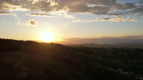 Beautiful sunset with drone. In the foreground a mountain Stock Footage 200974246