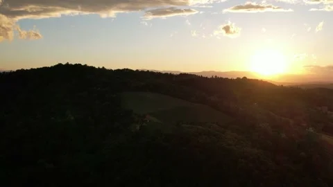 Beautiful sunset with drone. In the foreground a mountain Stock Footage 200974726