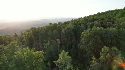 Beautiful sunset with drone. In the foreground a mountain Stock Footage 200977585