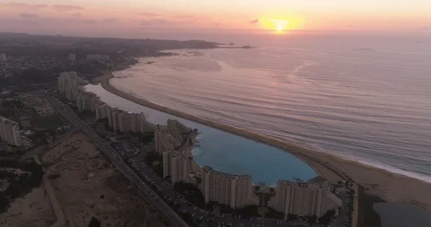 Beautiful Sunset Facing Pool and Ocean ‚ Aerial Drone View Stock Footage 103737480