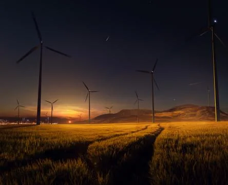 Beautiful sunset field with wind mill generators. big city in background Stock Photos