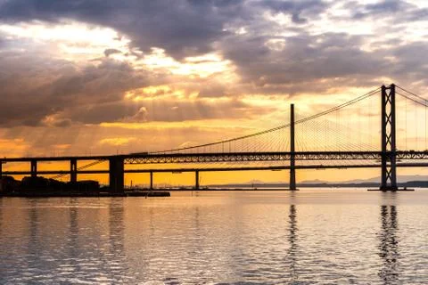 Beautiful sunset at The Forth road bridge and Queensferry crossing bridge Edi Stock Photos