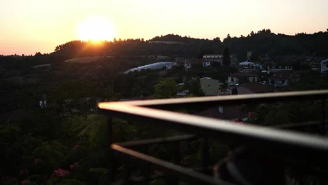 Beautiful sunset illuminates the mountain casting long shadows over tranquil Stock Footage 280305546