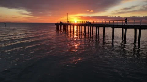 Beautiful Sunset With Jetty, Ocean View, Drone 6K Video stock 332599071