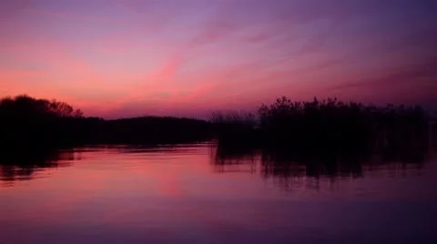 Beautiful sunset on the lake Stock Footage 8994333