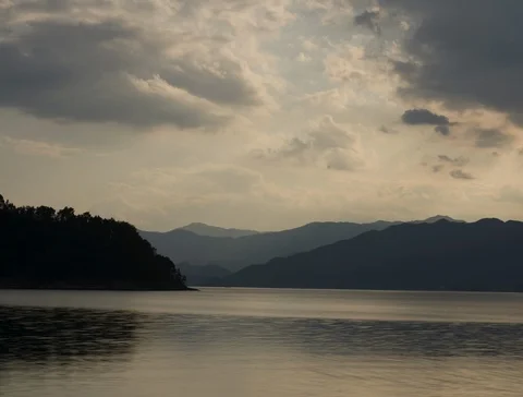 A beautiful sunset by the lake 스톡 동영상 125075403