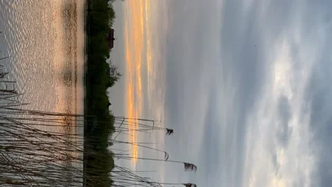 BEAUTIFUL SUNSET BY THE LAKE 스톡 동영상 231176555