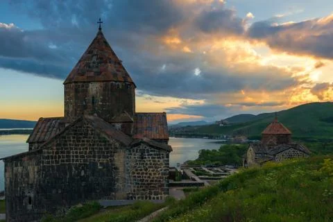 Beautiful sunset on Lake Sevan, dramatic sky over Sevanavank Monastery, Armen 스톡 사진