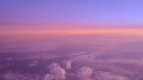 Beautiful sunset looking from an airplane window Video stock 133853812