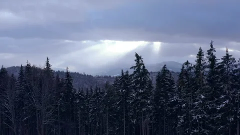 Beautiful sunset in the mountains. the rays of the sun shine between the clouds Stock Footage 147253627