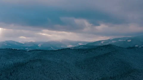 Beautiful sunset in the mountains. the rays of the sun shine between the clouds Stock Footage 147254367