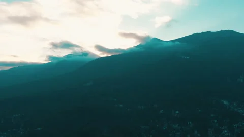 Beautiful sunset in the mountains. the rays of the sun shine between the clouds Stock Footage 169018744