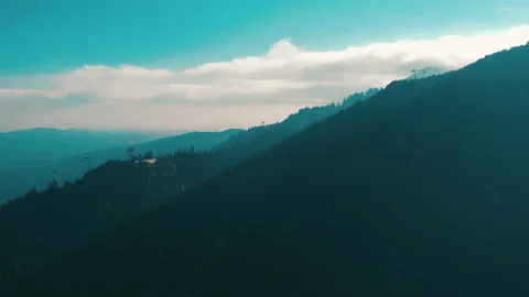 Beautiful sunset in the mountains. the rays of the sun shine between the clouds Stock Footage 169019021