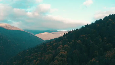 Beautiful sunset in the mountains. the rays of the sun shine between the clouds Stock Footage 169019619