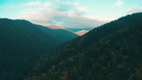 Beautiful sunset in the mountains. the rays of the sun shine between the clouds Stock Footage 169019711