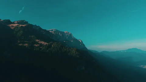 Beautiful sunset in the mountains. the rays of the sun shine between the clouds Stock Footage 169019832