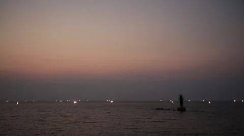 Beautiful sunset with ocean and lighthouse after sunset Video stock 54317093