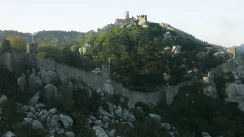 Beautiful sunset over the ancient castle, surrounded by dense forests 動画素材 162295101